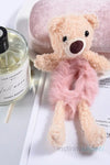 a pink teddy bear holding a pink teddy bear 