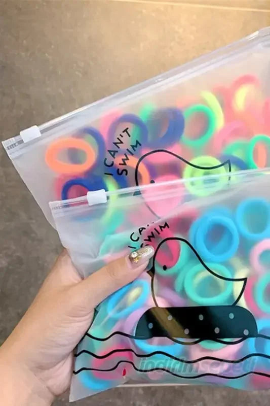 Şeffaf Kilitli Çantalı 80-85 Ad. Fosforlu Karışık Saç Lastik Toka - Indirimsepeti