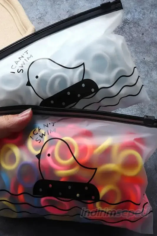 Şeffaf Kilitli Çantalı 80-85 Ad. Fosforlu Karışık Saç Lastik Toka - Indirimsepeti